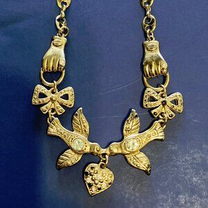 Vintage necklace two hand birds with dangling heart